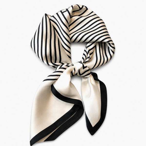 Black and white striped scarf on a white background