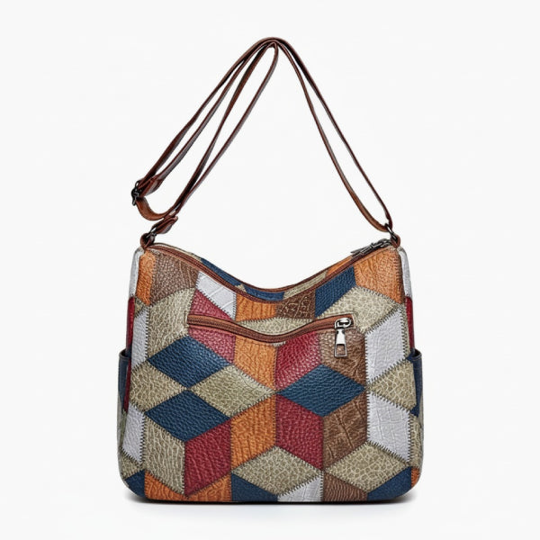Vera Vegan Leather Crossbody Bag in brown, back studio view highlighting geometric patchwork pattern and dual shoulder straps