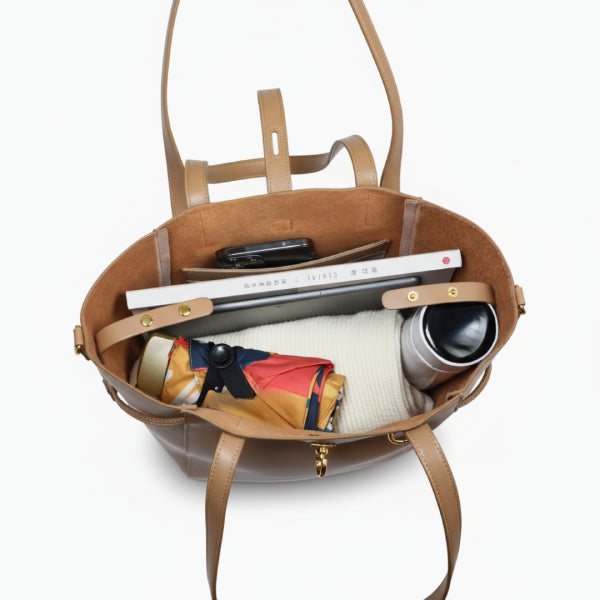 Interior view of the Zairen genuine cowhide tote bag in brown, displaying the spacious compartment and organization features