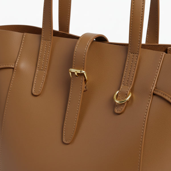 Zairen Genuine Leather Tote Bag in brown, close-up showcasing the leather texture and gold hardware